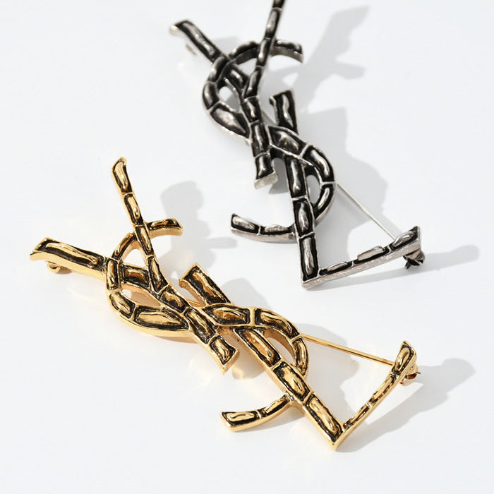 SAINT LAURENT オピウムYSLクロコ型押しブローチ
