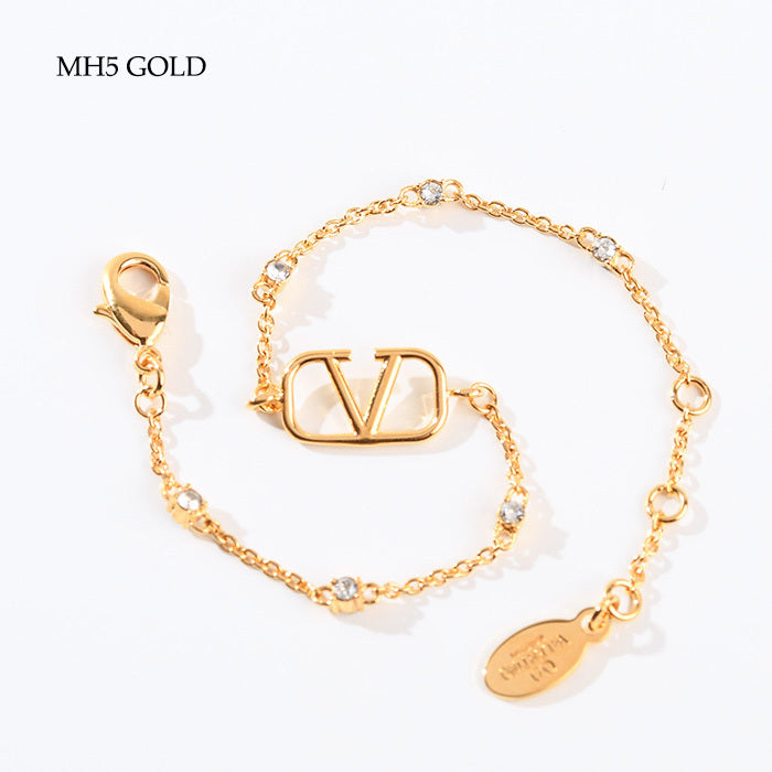 VALENTINO Vロゴ メタル x クリスタル ブレスレット