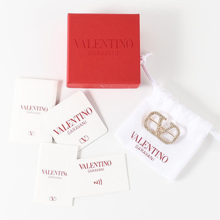 VALENTINO Vロゴ シグネチャー クリスタル ブローチ
