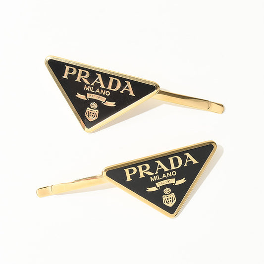 PRADA メタル ヘアクリップ