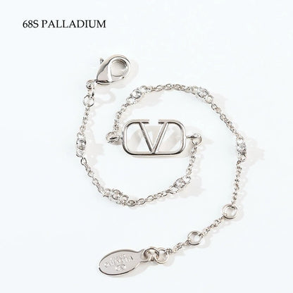 VALENTINO Vロゴ メタル x クリスタル ブレスレット