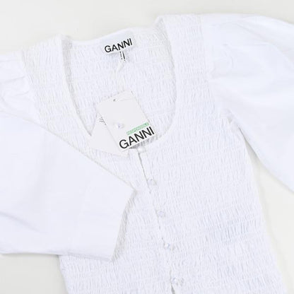 GANNI 코튼 포프린 스모크 블라우스 