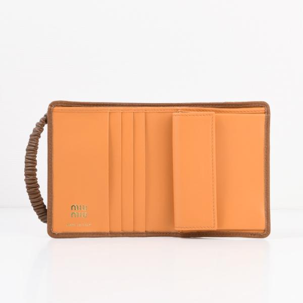 MIU MIU レザーバンド付き 二つ折り財布