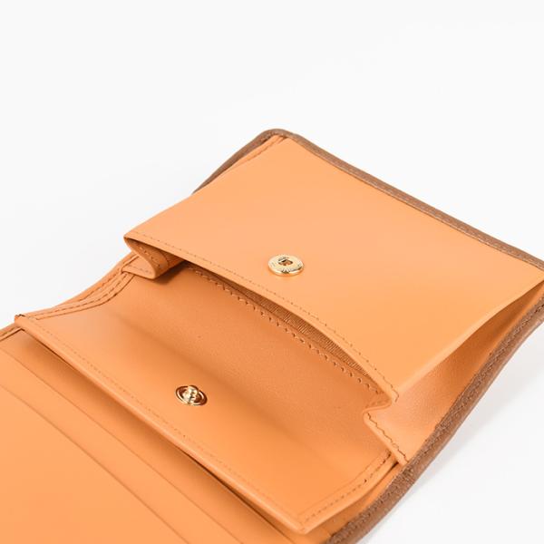 MIU MIU レザーバンド付き 二つ折り財布