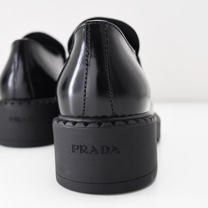 PRADA チョコレートブラッシュドローファー