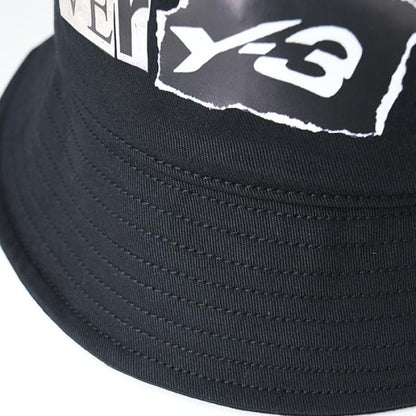 Y-3 GRAPHIC BUCKET HAT