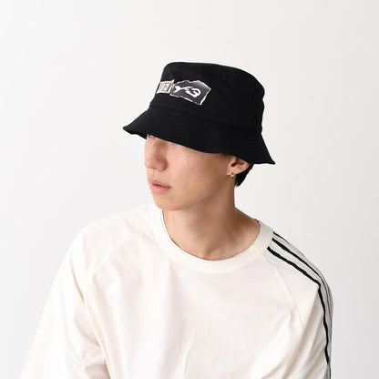 Y-3 GRAPHIC BUCKET HAT